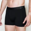 model wearing unwear onyx black boxer brief close up side