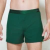 model wearing unwear noble green boxer shorts close up front