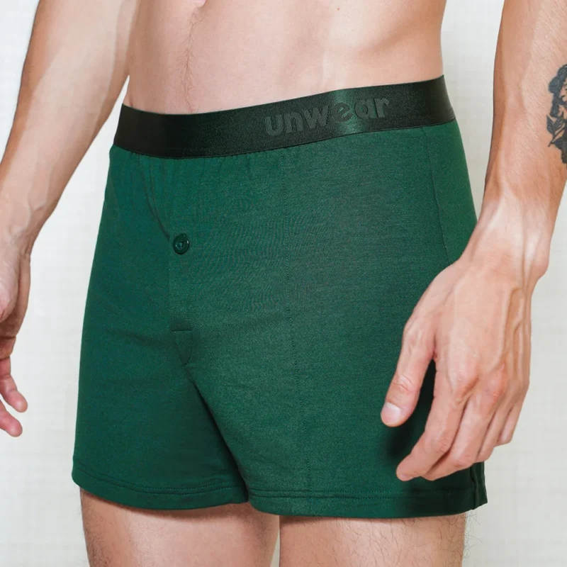model wearing unwear noble green boxer shorts close up side