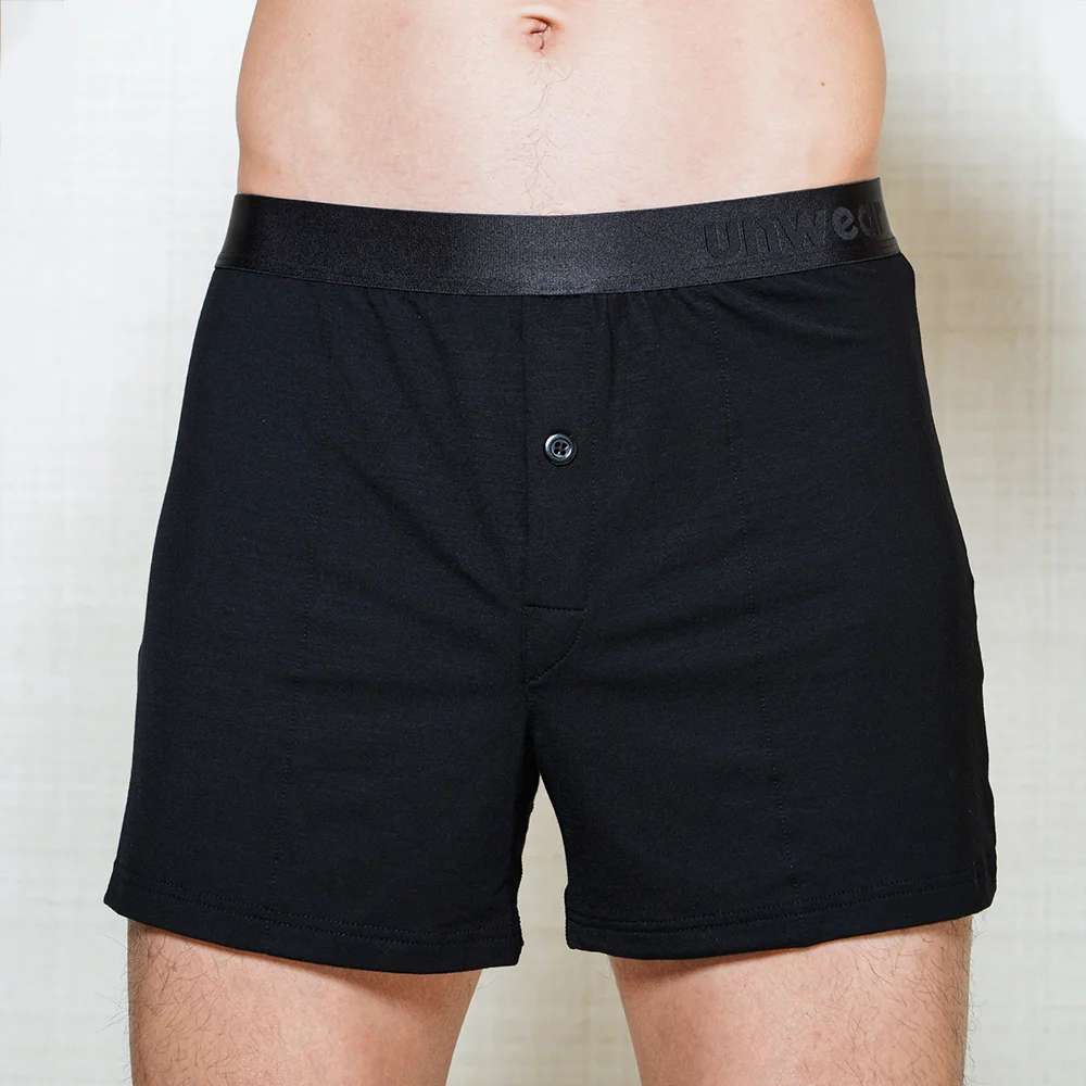 model wearing unwear onyx black boxer shorts close up front