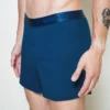 model wearing unwear rocking blues boxer shorts close up side