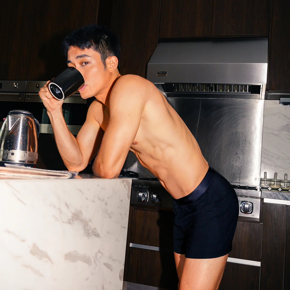 model wearing unwear onyx black modal boxer shorts